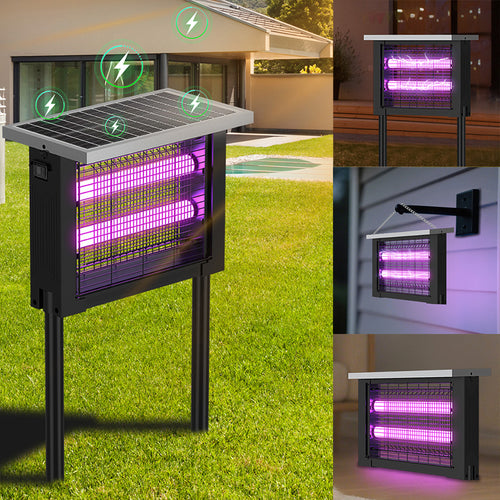 Insect zapper with solar panel on grass, close-up of purple lights, and outdoor setting.