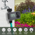 AxiaTool LED display timer automatic watering sprinkler in a garden setting, showcasing its control panel and watering mechanism.