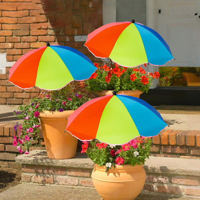 Colorful umbrellas protecting potted plants on a porch.
