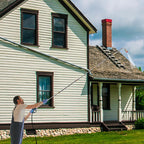 7-piece AxiaTool pressure washer set with extension wand and various nozzles for versatile outdoor cleaning.