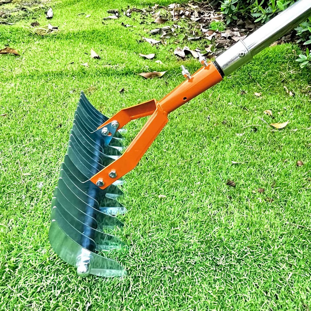 AxiaTool long reach thatch rake with a sturdy handle and sharp tines for effective lawn care and garden maintenance.