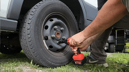 AxiaTool brushless cordless impact wrench with battery, showcasing ergonomic design and powerful performance for garden tasks.