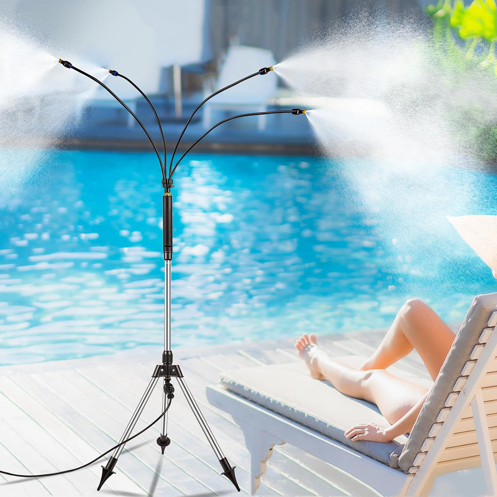 Misting device with three nozzles emitting mist over a poolside area.
