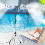 Misting device with three nozzles emitting mist over a poolside area.