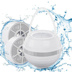 White spherical speaker with water droplets and splashes on a white background