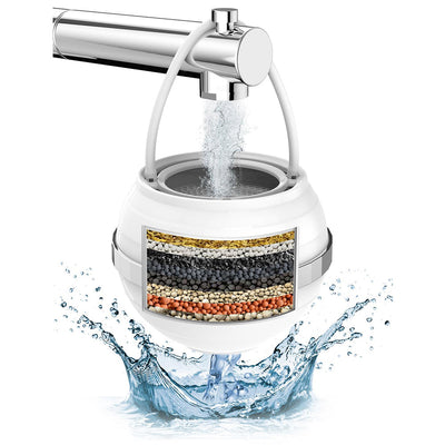 Water filter with water flowing out on a white background