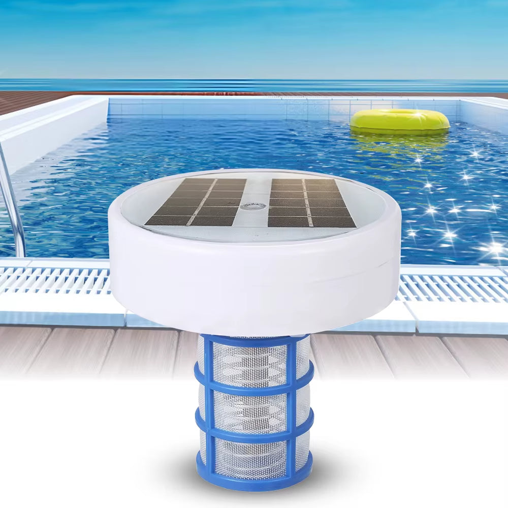Solar pool cleaner with a pool and inflatable float in the background