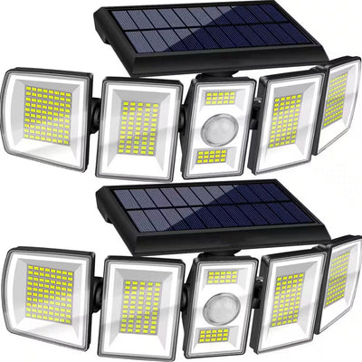 Set of solar flood lights with motion sensor on a white background