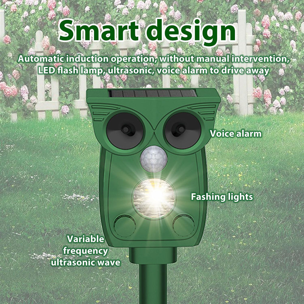 Green owl-shaped pest control device with LED flash lamp and ultrasonic waves on a grassy background.