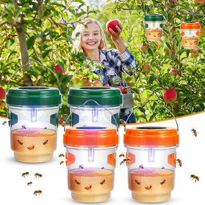 AxiaTool 4 pack solar powered wasp traps hanging outdoors in a garden setting.